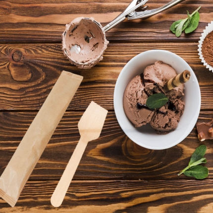 Eco-friendly wooden ice cream spoons individually wrapped in kraft paper