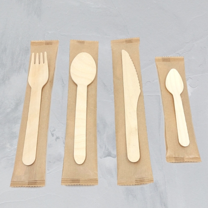 Eco-friendly wooden cutlery individually wrapped in kraft paper